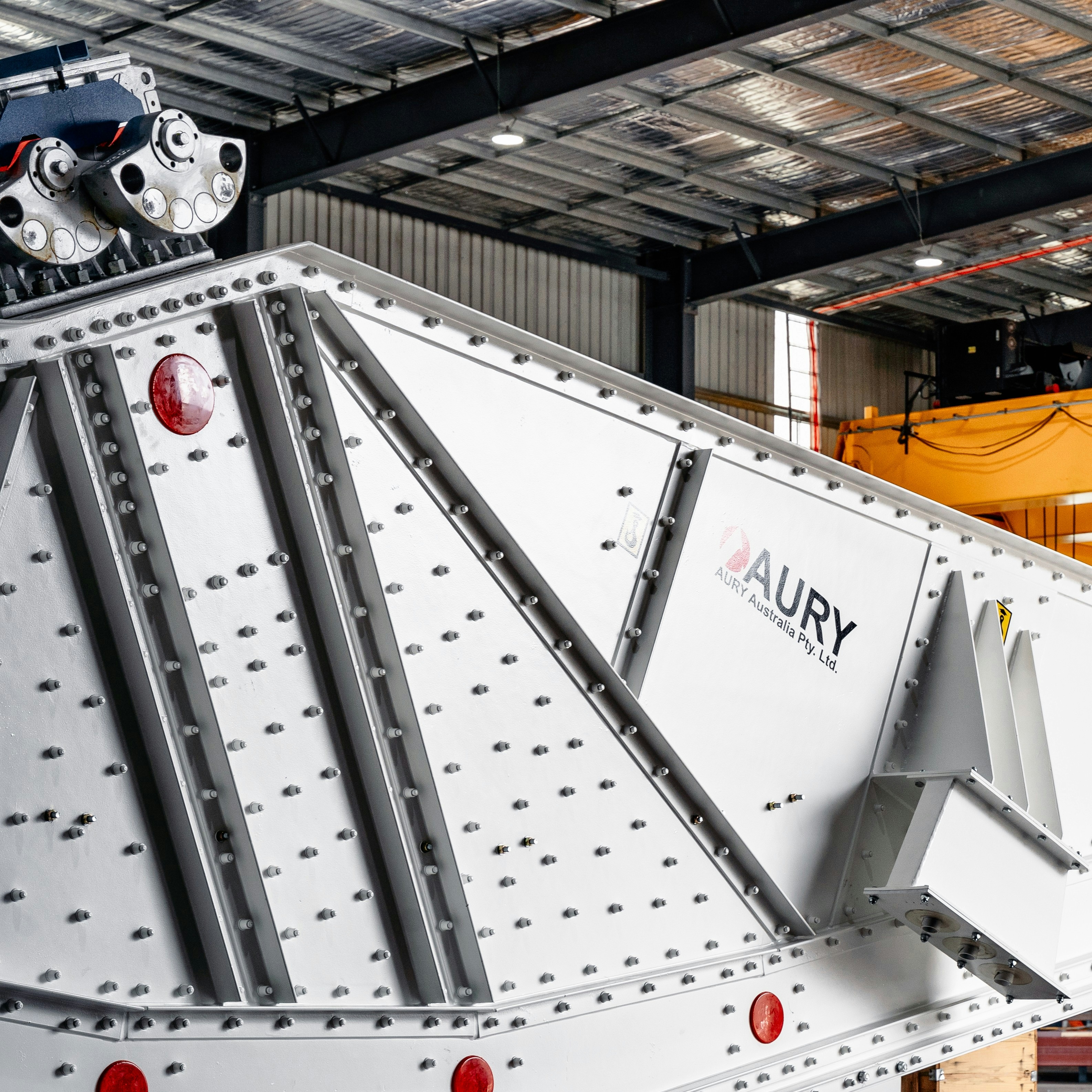 Close-up of Aury screening equipment in a workshop.